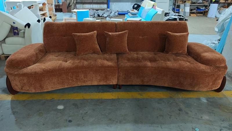 Wall-hugger power recliner sofa positioned close to the wall in a Singapore living room